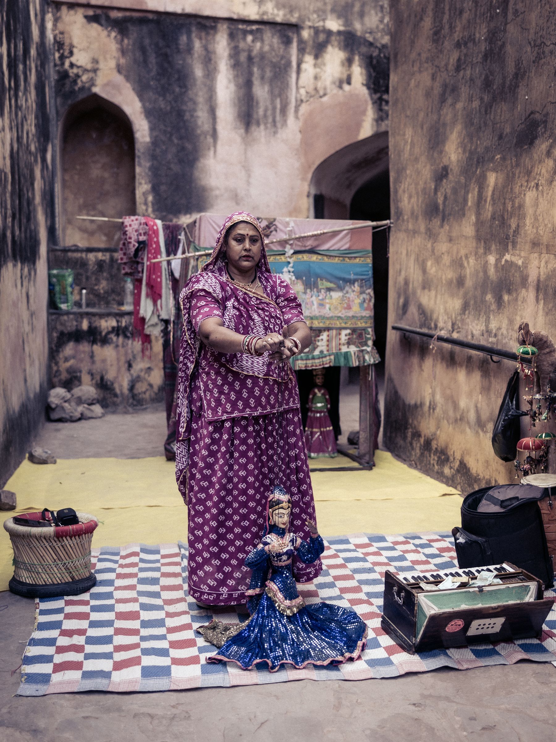 Woman With Puppet Display Setup